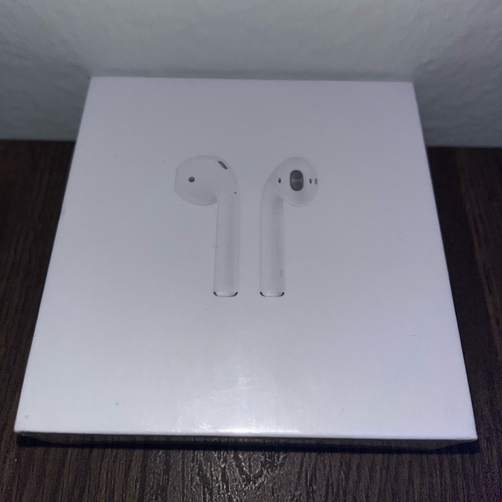 Airpods generation 2, comes with charger. Never used!